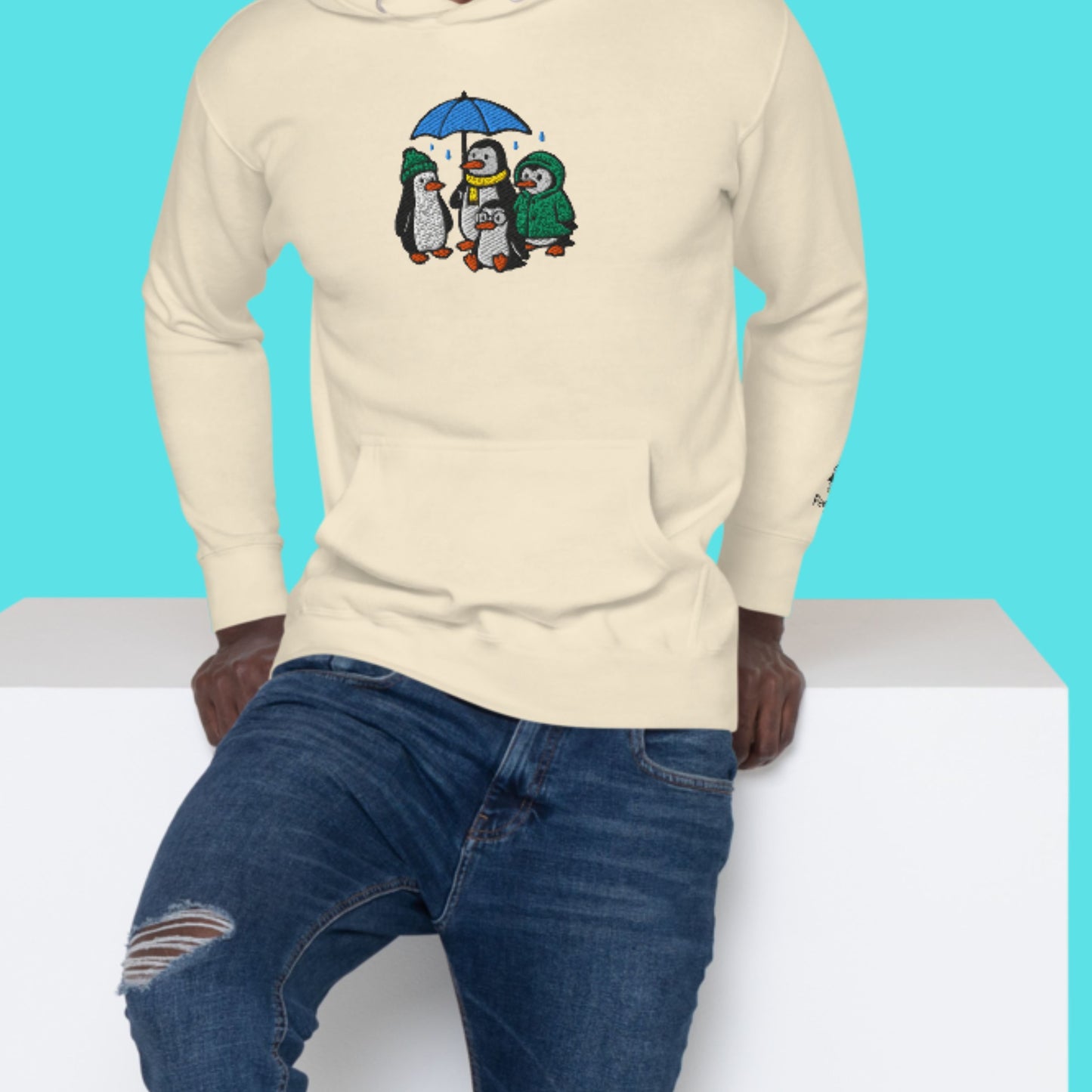 Penguin Family Under Rain – Embroidered Unisex Hoodie